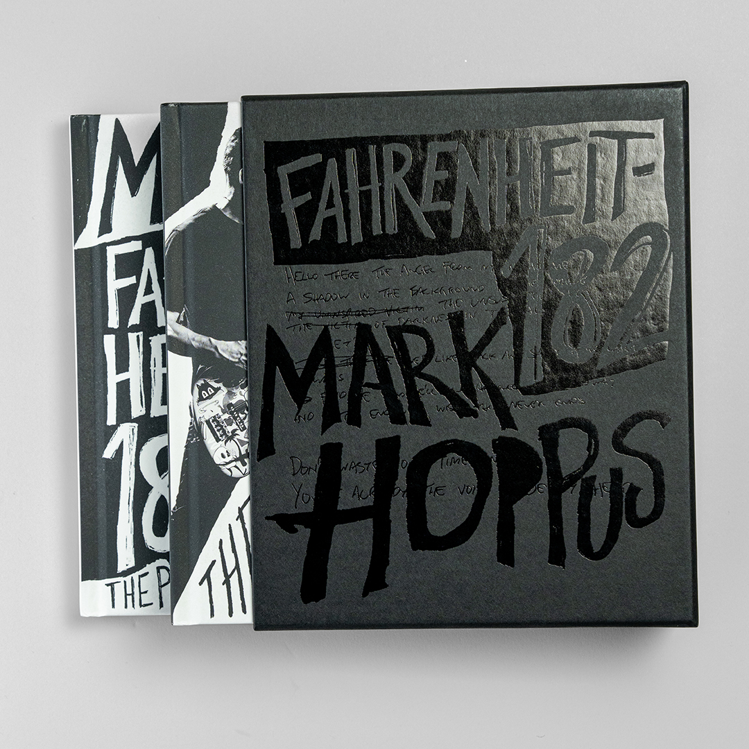 The two volumes slide out of the slipcase, featuring black and white photography and stylised typography.